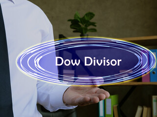  Financial concept about Dow Divisor with inscription on the page.