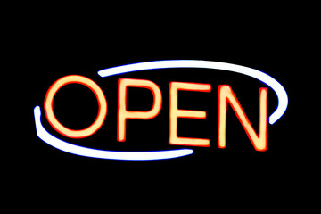 'OPEN' neon sign on black background 