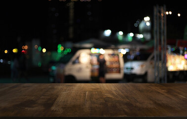 Empty wooden table in front of abstract blurred background of coffee shop . can be used for display or montage your products.Mock up for display of product