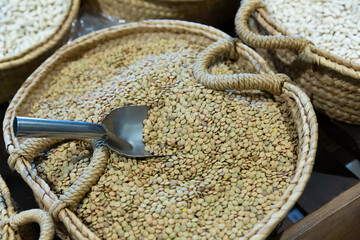 Baskets with lentils in food market. High quality photo