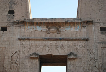 Ancient hieroglyph and colored ceiling at the temple of Edfu. Egypt

