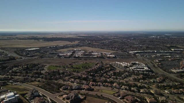 Panning shot of Palladio Mall in Folsom and the Folsom Ranch development south of highway 50.
