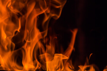 Orange flames on a dark background.