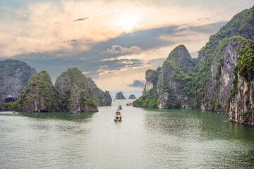 Aerial view panorama of floating fishing village and rock island, Halong Bay, Vietnam, Southeast Asia. UNESCO World Heritage Site. Junk boat cruise to Ha Long Bay. Popular landmark of Vietnam © galitskaya