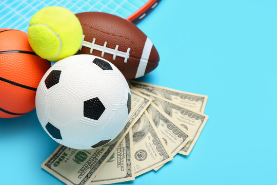 Money and balls on color background. Concept of sports bet