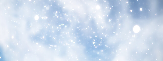 blue snowfall bokeh background, abstract snowflake background on blurred abstract blue