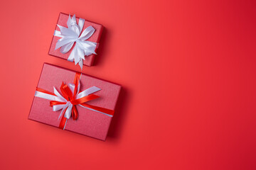 Double red gift box with bow on red background top view, Valentines day, Flat lay style with copy space