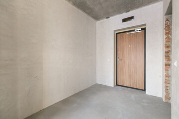 interior of the apartment without decoration in gray colors