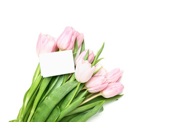 Beautiful flowers and blank card on white background
