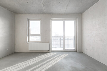 interior of the apartment without decoration in gray colors