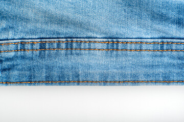 Stitching on jeans. Denim blue. Seam on fabric