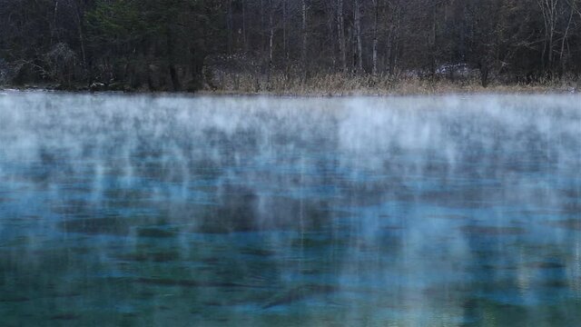 The morning mist floating over the lake. The beautiful Jiuzhaigou Valley, National Park in winter in aba prefecture, sichuan province, China. Inclusion on the World Natural Heritage List in 1992.