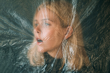 Female protection. Defocused art portrait. Social pressure. Anxious blonde woman face isolated...