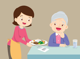 mother serving food to elderly woman