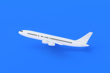 Modern passenger airplane on blue background. Charter flights. Air transportation. International airlines. Tourist travel on vacation. 3d rendering