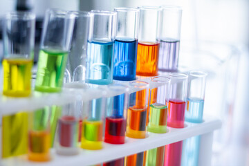 A test tube with colorful water inside the tube