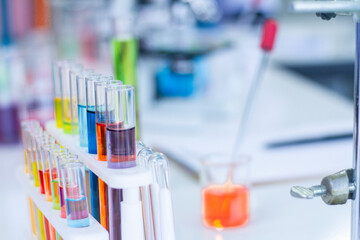 A test tube with colorful water inside the tube