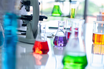 Beaker and glass tubes with colored water inside