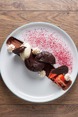 Chocolate brownie with strawberries