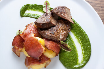 Grilled liver with spinach and bacon potatoes