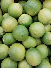 set of yellow and green limes top view