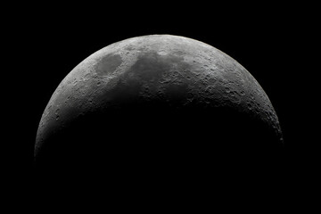 High resolution telescope photograph of the moon. Crescent moon.