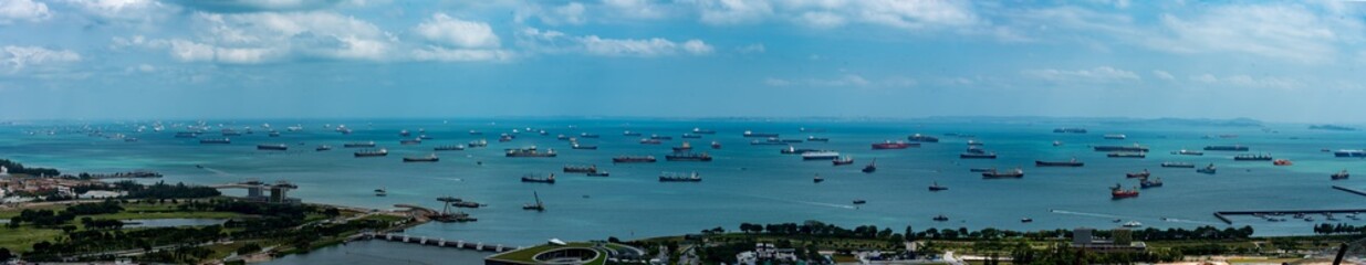 Ships waiting in Singapore harbor during COVID pandemic lockdown - obrazy, fototapety, plakaty