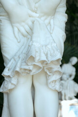 A beautiful marble statue of a girl in the Vorontsov Palace. 19th century. Detail of the dress close-up.