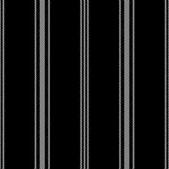 Stripe pattern. Textured seamless vertical lines in monochrome black and white for summer, autumn, winter dress, trousers, shirt, or other modern fashion or home textile design. Vector background.