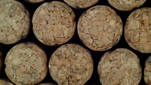 Background a lot different wine corks. Dolly video. Selective soft focus. Close-up.