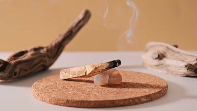 Peruvian palo santo holy wood smoke smolders. Esoteric objects for meditation, antistress and relaxation purifying concept. Smudge kit for spiritual practices.