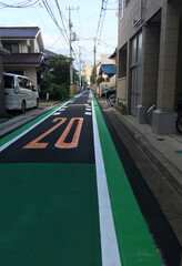 low speed street in the city  Tokyo Japan; urban design; urban planning; transportation; streets; safety. 