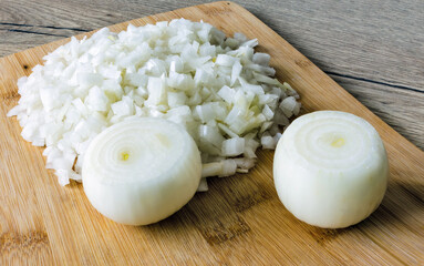 chopped onions on a cutting board