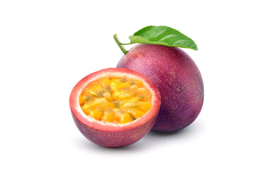 Purple passion fruit (Passiflora edulis) with cut in half and green leaf isolated on white background. Clipping path..