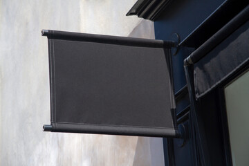 Storefront kakemono Mockup. Shop sign on a wall in street template © sdecoret