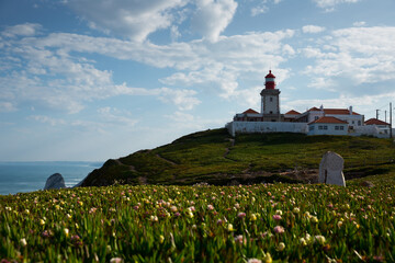 Fototapeta na wymiar Picturesque spring Cabo da Roca landscape with lighthouse, Sintra-Cascais Natural Park, Portugal