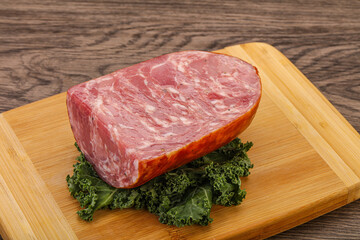 Beef ham piece over board