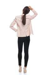 confused young woman scratching head and thinking of ways to solve problems