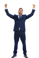 enthusiastic businessman holding hands in the air and celebrating