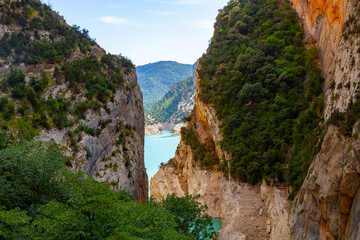 Picturesque rocky landscape of natural masterpiece of Mont-Rebei Gorge with Noguera Ribagorcana River on sunny summer day, Catalonia, Spain