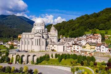General view of picturesque Re village in green Italian Alps in sunny summer day looking out over...