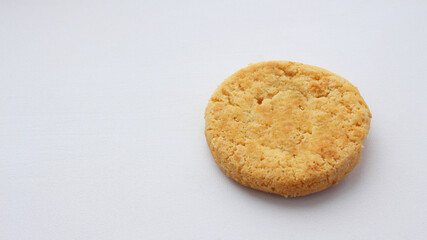 Round all crunchy cookies isolated on white background. Sweet cookies. Bakery products. Place for text, selective focus