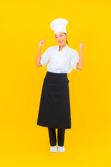 Portrait beautiful young asian woman in chef or cook uniform with hat