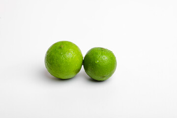 Fresh lime isolated on white background