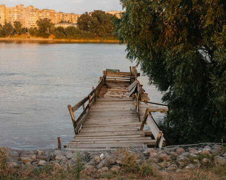 Destroyed wooden bridge and river stones nature fresh air