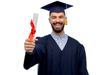 education, graduation and people concept - happy smiling male graduate student in mortar board and bachelor gown with diploma over grey background
