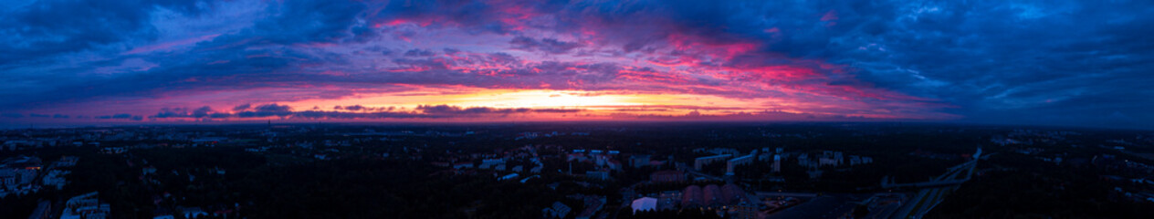 Fiery panoramic end of the world scene. Dramatic colorful sunset over the city of Helsinki, Finland.