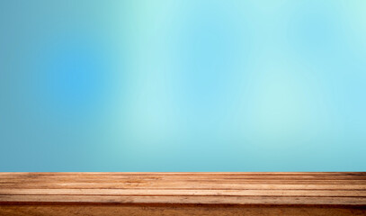 Empty table top made of natural wood, light.rays from the window on the background of the wall. For...