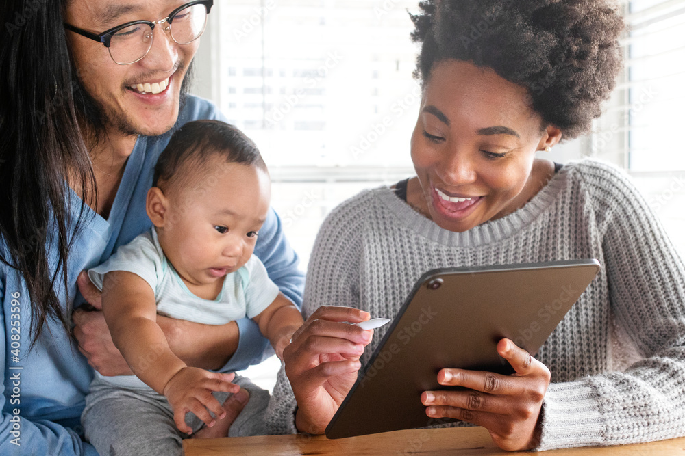 Wall mural Multiethnic family planning their son savings plan