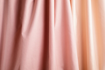 Pink and beige fabric background. Abstract backdrop, luxury cloth